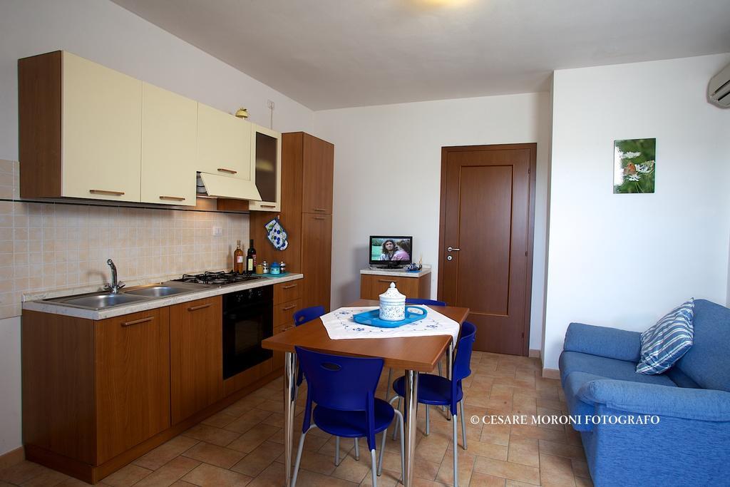 Residence Ai Campi Da Golf Saturnia Room photo