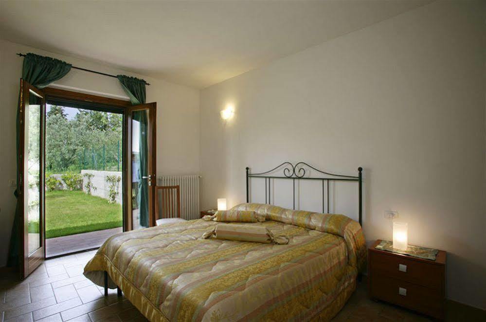 Residence Ai Campi Da Golf Saturnia Exterior photo